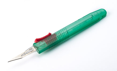 A single green and red disposable retractable safety scalpel with a blade.