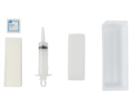 An irrigation tray with a 60mL piston syringe, alcohol prep pad, and container tray, all laid out on a white background.