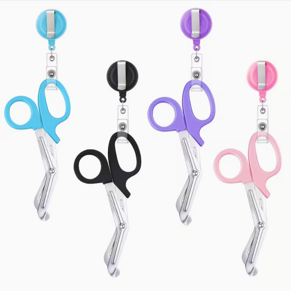 Set of four pairs of scissors with colorful retractable holders on a white background