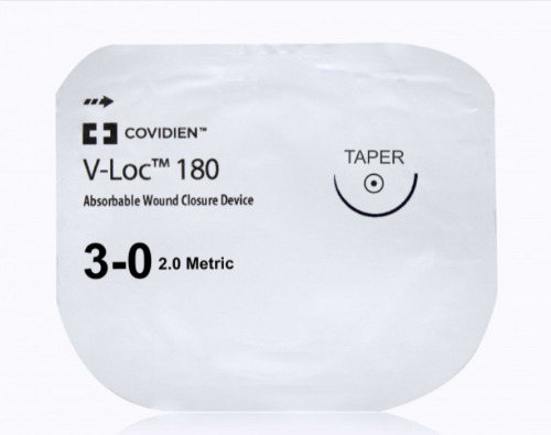 Absorbable wound closure device packaging with COVIDIEN branding on a white background