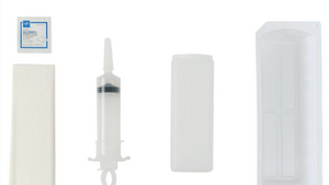 An irrigation tray with a 60mL piston syringe, alcohol prep pad, and container tray, all laid out on a white background.