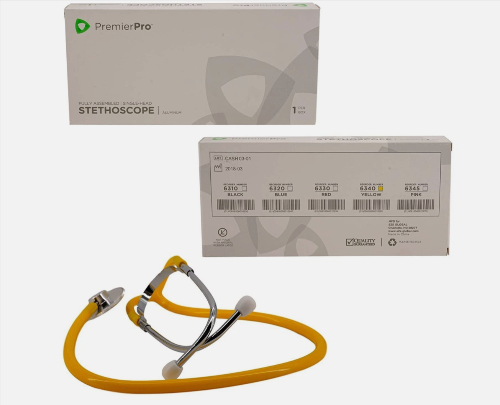 Yellow stethoscope with its packaging on a white background