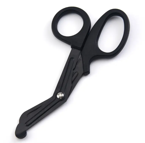 A collection of trauma shears in black, orange, and green colors, with straight blades and ergonomic handles.