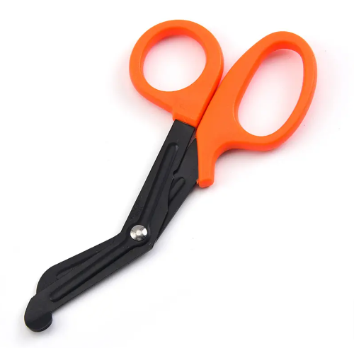 A collection of trauma shears in black, orange, and green colors, with straight blades and ergonomic handles.