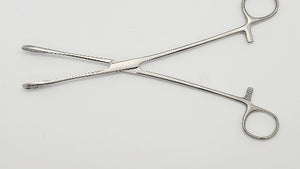 A straight, serrated sponge forceps with a ring, ratcheted grip. The forceps are made of stainless steel.