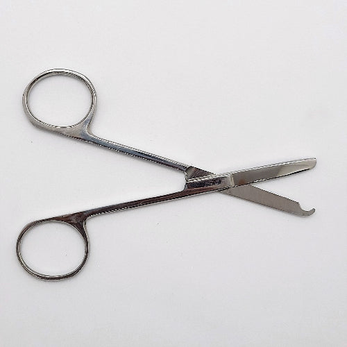 A pair of silver-colored ligature gum scissors with curved blades and a small hook at the end of one blade.