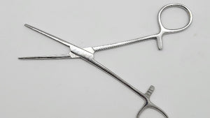 A stainless steel Mayo-Hegar long jaw needle holder with serrated teeth, designed for surgical procedures.