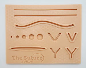 The Suture Buddy Pad with Port Holes